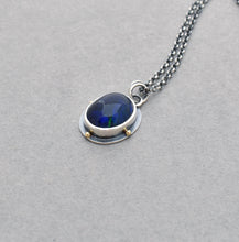 Black Opal Necklace with Gold Accents.