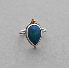 Ethiopian Opal Ring. Blue with Flash. Size 7.
