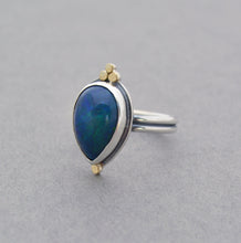 Ethiopian Opal Ring. Blue with Flash. Size 7.