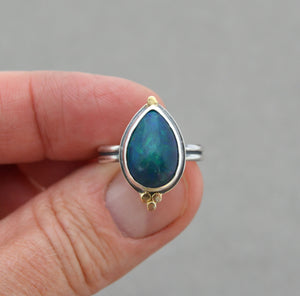 Ethiopian Opal Ring. Blue with Flash. Size 7.