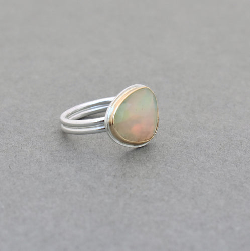 Ethiopian Opal Ring. Fiery Opal in Gold Bezel and Shiny Sterling Silver. Size 8.
