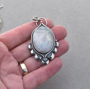 Moonstone Pendant with Crescent Accents.